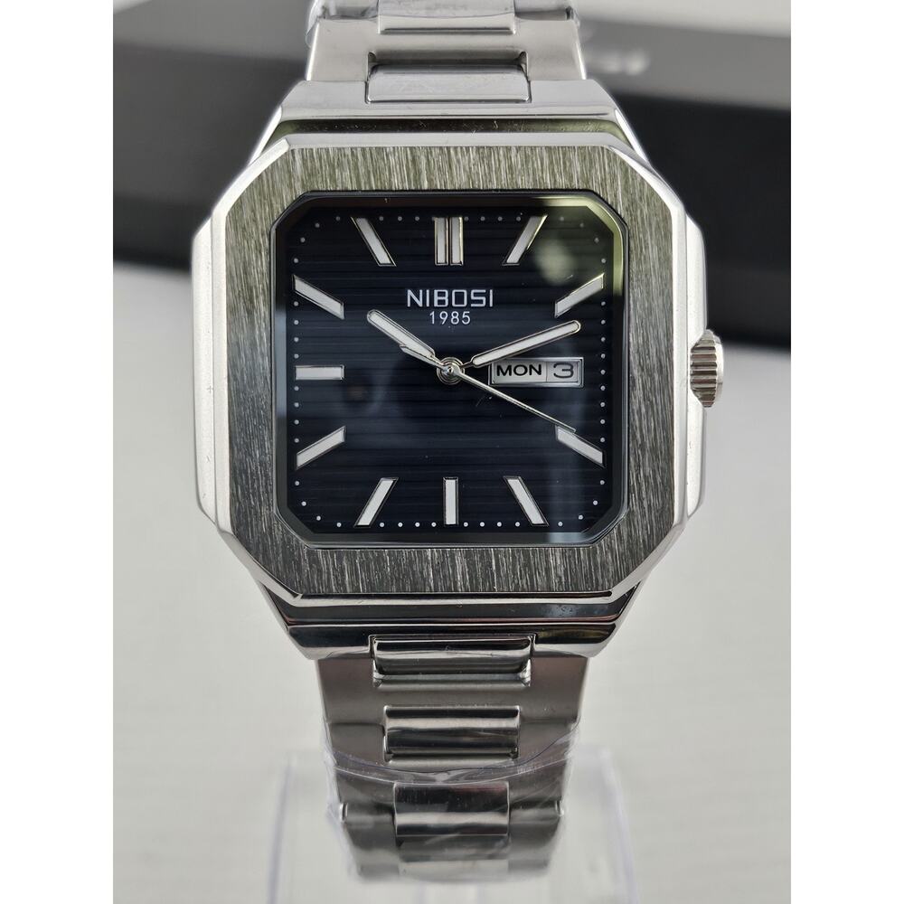 New In Box Nibosi 1985 Blue Striped Dial Day Date Quartz Movement Running
